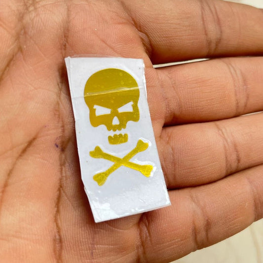 Gold Vinyl Skull Sticker